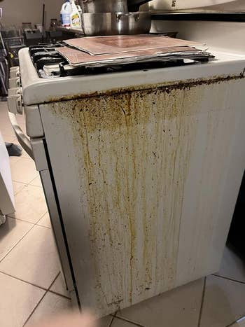 Dirty room oven with grime and residue connected the side, highlighting the request for cleaning products and maintenance
