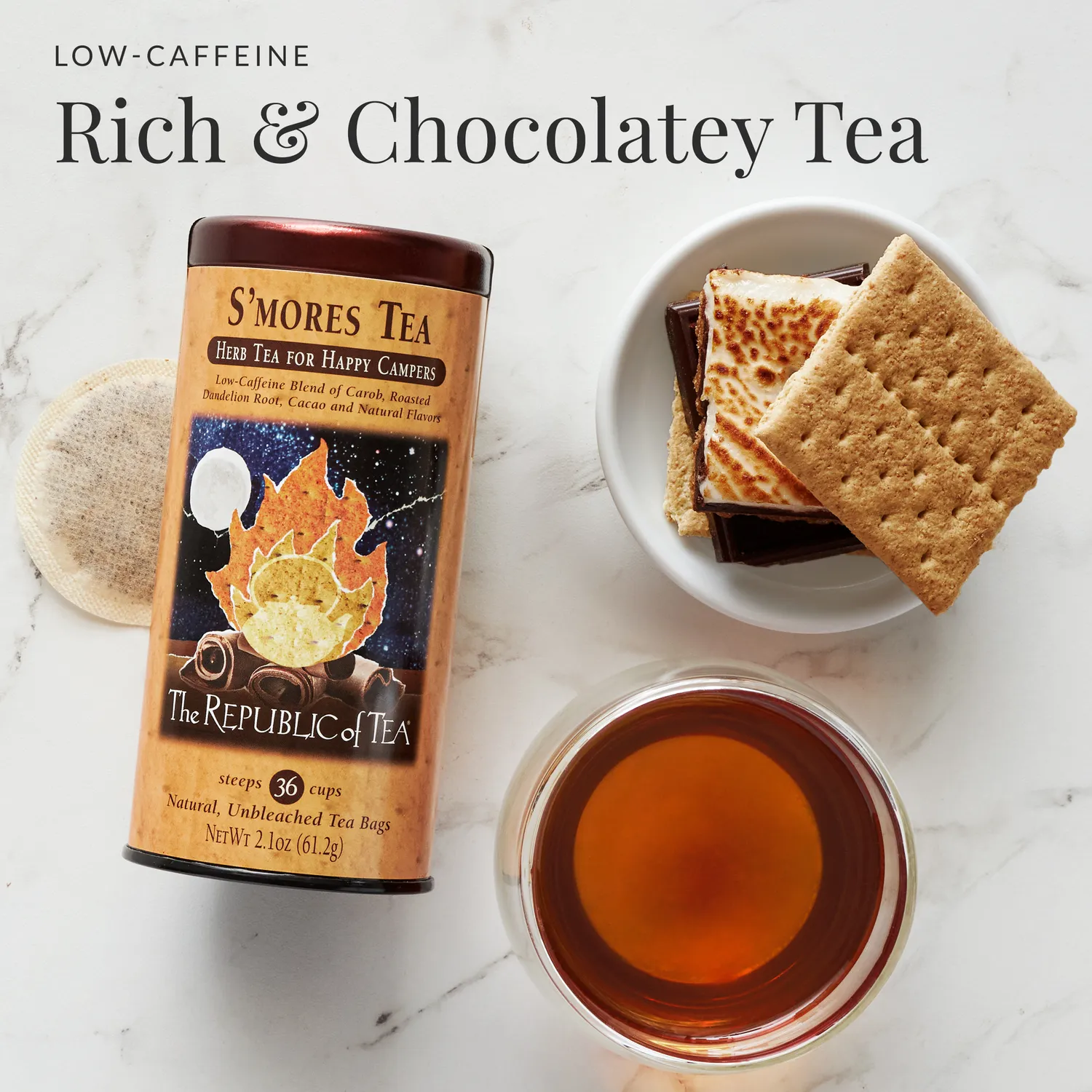 Canister of S'mores Tea with chocolate, graham crackers, and a cupful  of tea, promoting a low-caffeine, affluent  chocolatey beverage  flavor