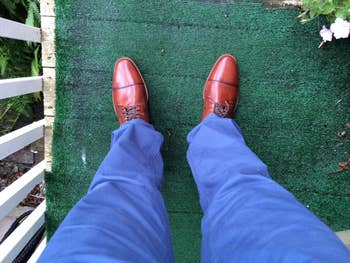 Reviewer photo of them wearing tan dress shoes and blue pants