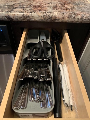 reviewer photo showing cutlery organizer in small narrow drawer