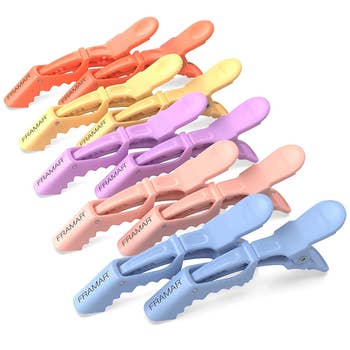 Eight hair clips from Framar in a stack, varying in pastel and bold hues, for styling purposes