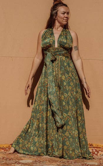 a model in the green jumpsuit
