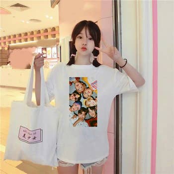 model wearing the bts t shirt in white