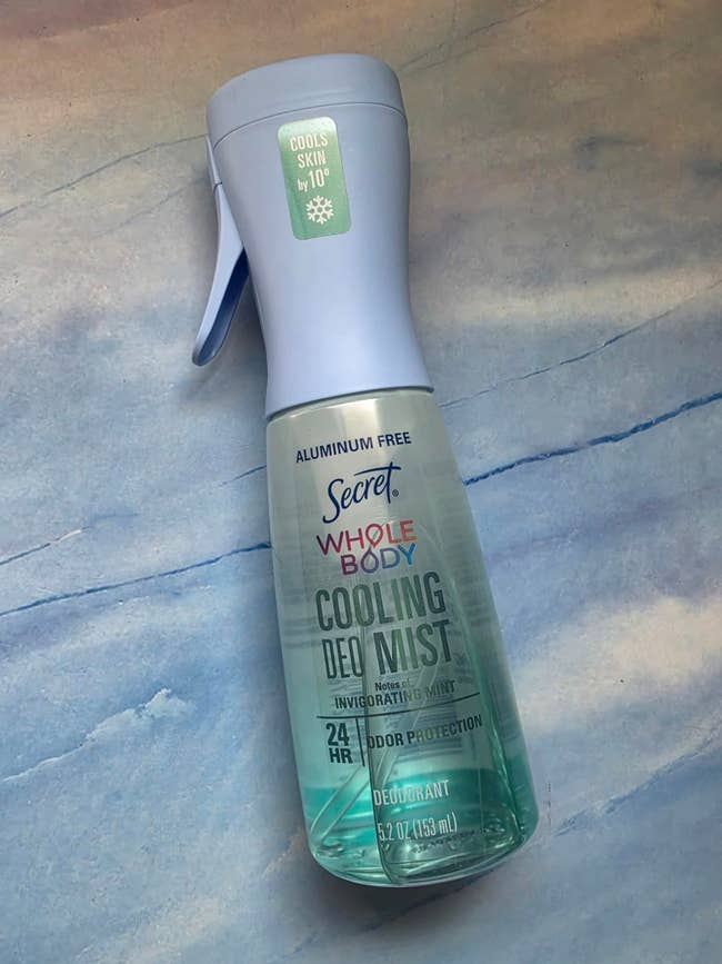 A vessel of Secret Whole Body Cooling Deo Mist with
