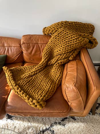 yellow blanket on buzzfeed editor's couch
