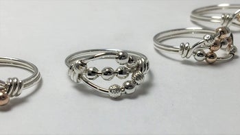 The rings laid out on white surface