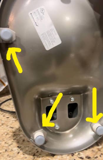Kitchen mixer's underside with sliders attached to it