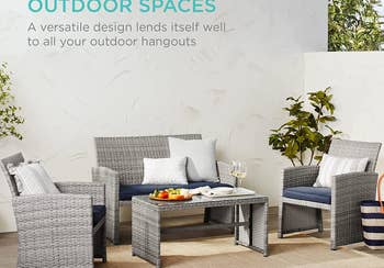 the gray patio set with blue cushions and additional throw pillows