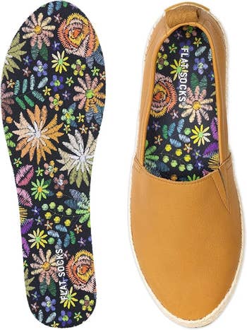 Floral patterned shoe insole next to a tan slip-on shoe with a floral interior