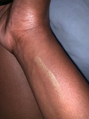 Reviewer arm with a swatch on it