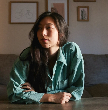 reviewer photo wearing the sage green shacket, buttoned up