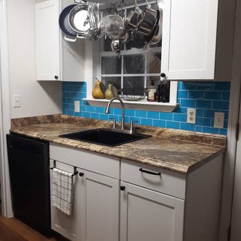another reviewer's kitchen with blue tiles