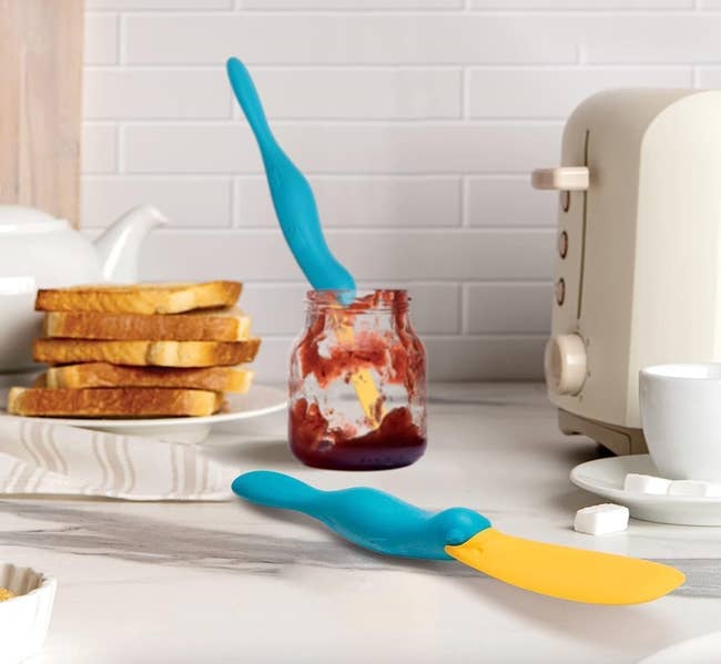 platypus shaped jar spatula in a container o