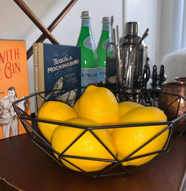 reviewer image of black wire fruit basket with lemons in it