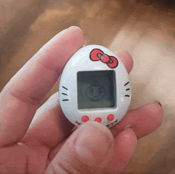 Reviewer gif of the Tamagotchi