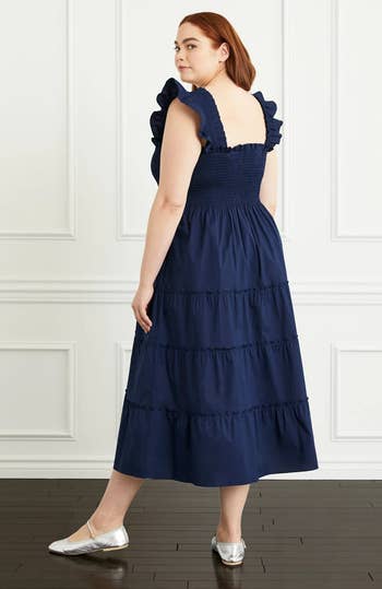 model showing the back of the dark blue nap dress