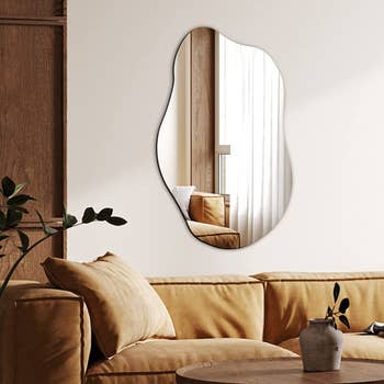the wavy mirror on a wall