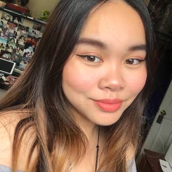 reviewer with a natural make-up look