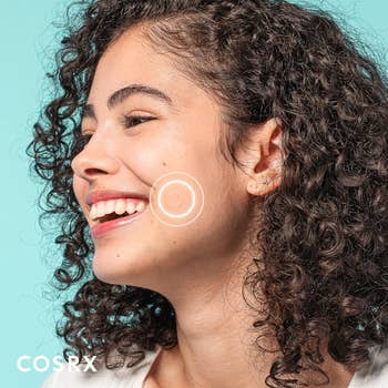 a exemplary  with the pimple spot  applied to their face