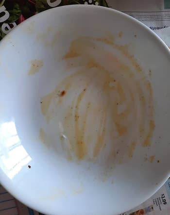 reviewer photo of a white bowl with food residue on it