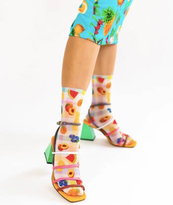 model wearing the socks with strappy sandals