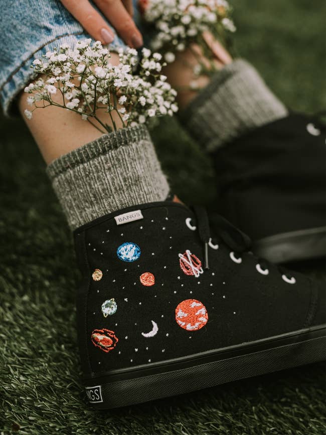 the black high-tops with galaxy designs