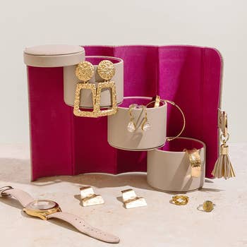 un-collapsed three-tier jewelry case