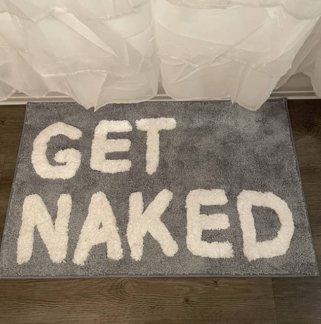 reviewer image of get naked grey bath mat in bathroom