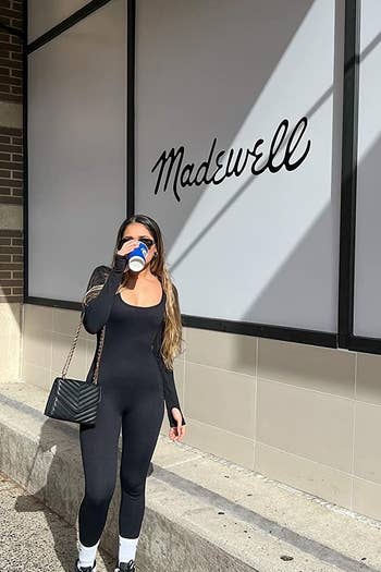 reviewer wearing the black bodysuit