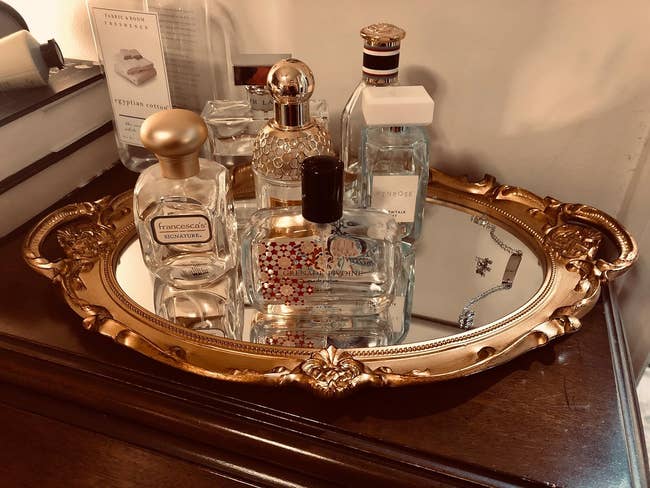 reviewer's perfume connected the mirror