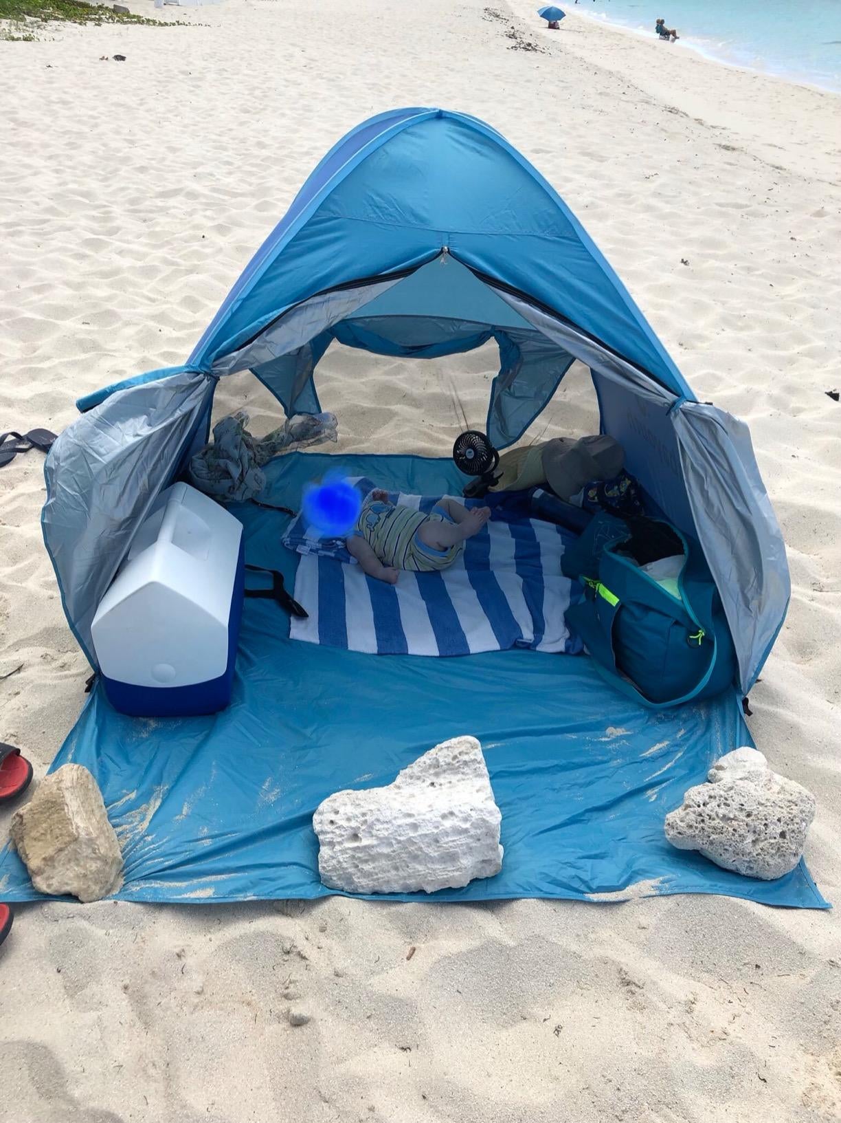 hotel customer picture of the blue camping tent at the beach