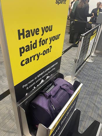the suitcase in Spirit Airlines carry-on size checker