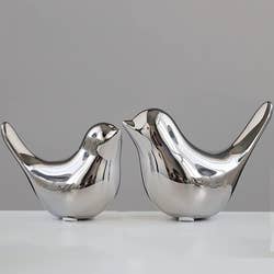 two birds in silver
