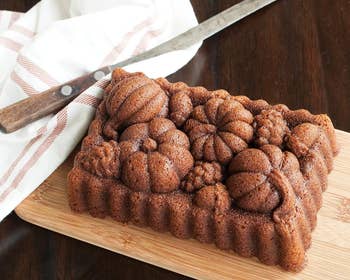 Loaf of bread with harvest produce indentation on top.