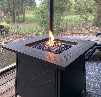 Reviewer image of the black fire pit with flames