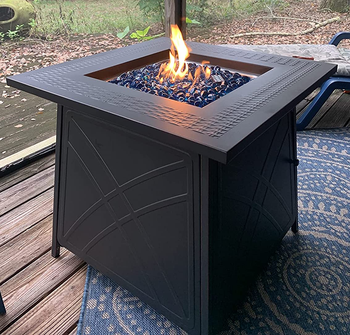 Reviewer image of the black fire pit with flames