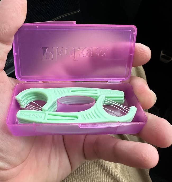 reviewer holding question lawsuit of flossers