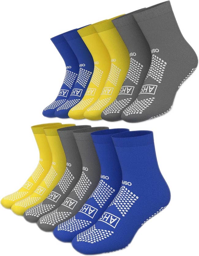 Assorted athletic socks with anti-slip logos, in three color pairs for sports or casual wear