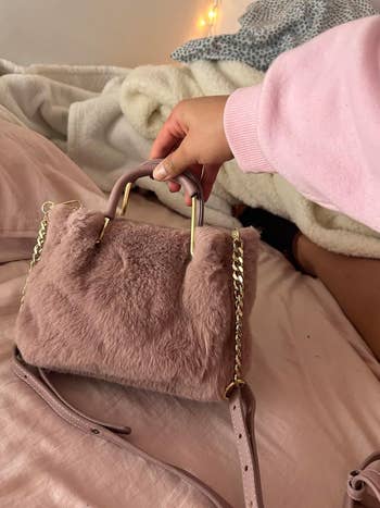 The aforesaid handbag after, hairsbreadth looking soft, smoothed, and marque caller again