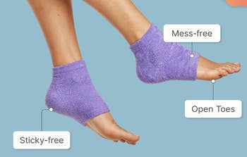 Feet wearing purple moisturizing socks labeled