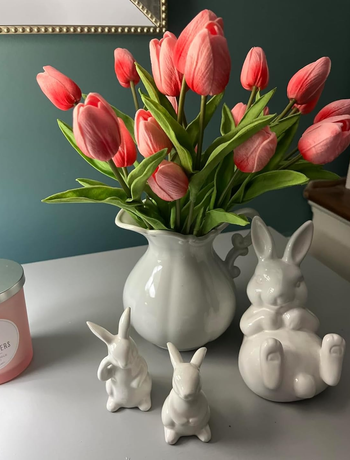 Vase with pink artificial tulips