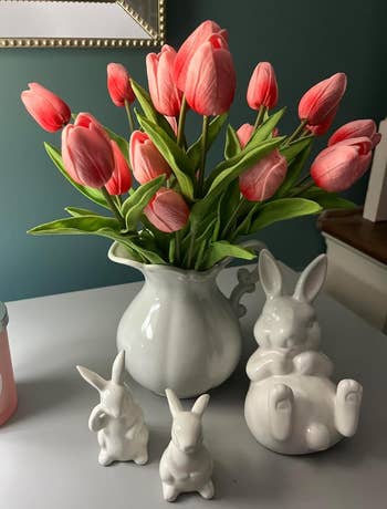 Vase with pink artificial tulips
