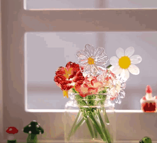 Hand holding flowers