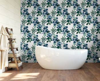 blue floral wallpaper in a bathroom