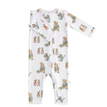 white baby pajamas with peter rabbit on them