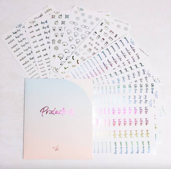rainbow foil sticker sheets with planner phrases like 