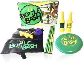 the bottle bash kit, including a frisbee, fake bottles, stakes for the ground, and a bag