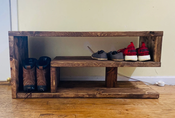 wooden shoe bench with shoes inside