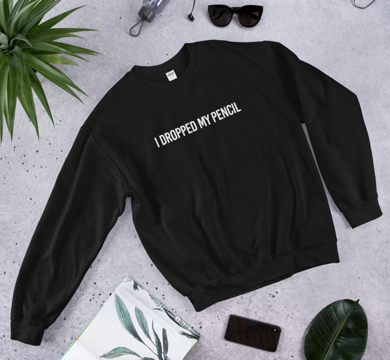 black crewneck with white text that reads 