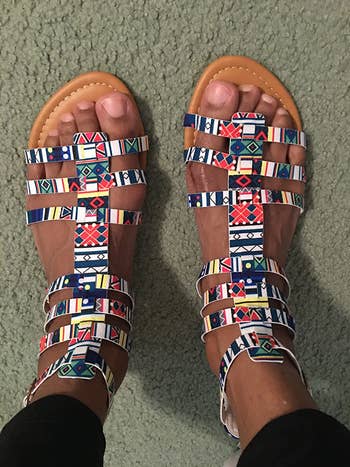 Reviewer image of person wearing Aztec patterned gladiator sandals 